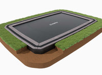 A ground level trampoline with a safety net enclosure. The trampoline is set in a garden environment, with a cross-section detail showing the safety padding and spring cover.