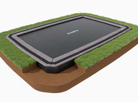 A ground level trampoline with a safety net enclosure. The trampoline is set in a garden environment, with a cross-section detail showing the safety padding and spring cover.